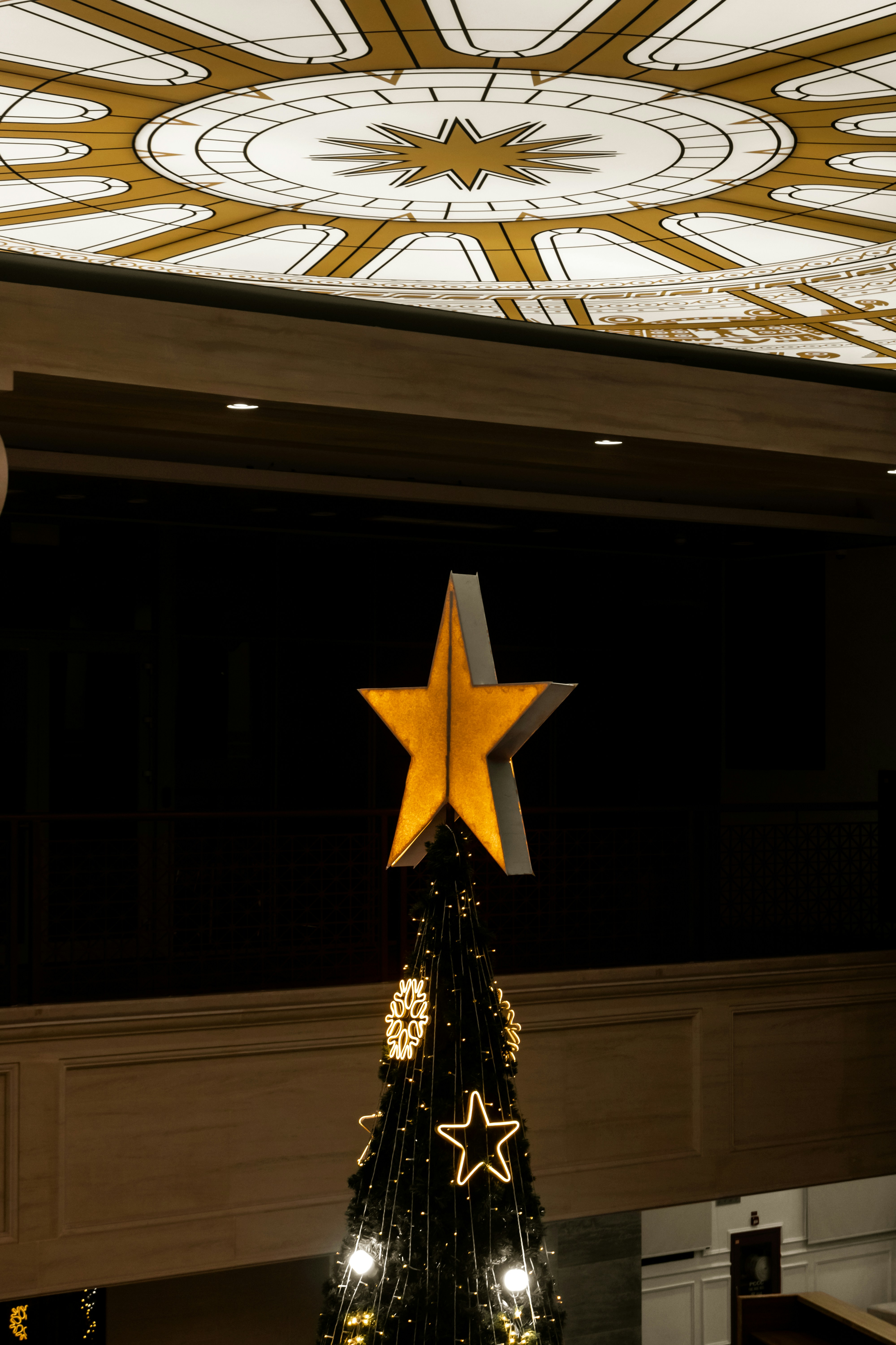 A decorated christmas tree with a star on top.