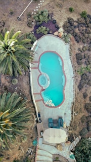 Aerial view of a swimming pool and spa area.