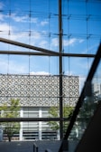 Modern building exterior seen through glass windows