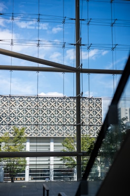 Modern building exterior seen through glass windows