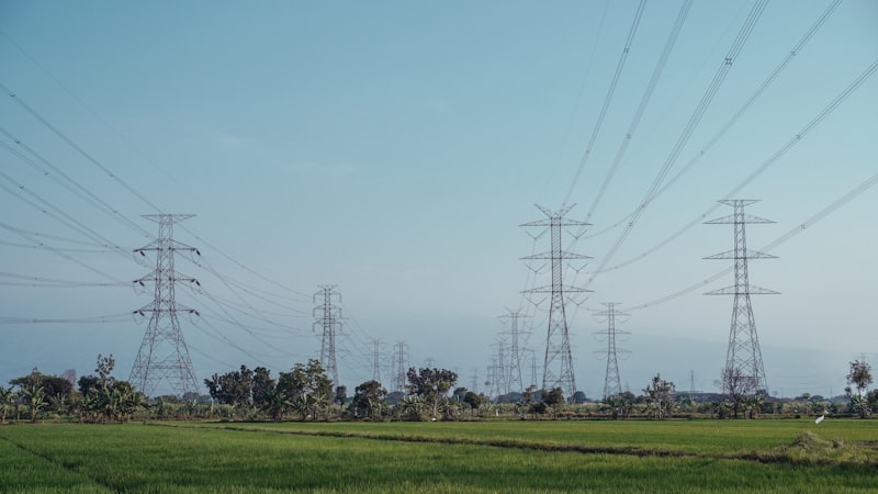 Electric towers and power lines across a field