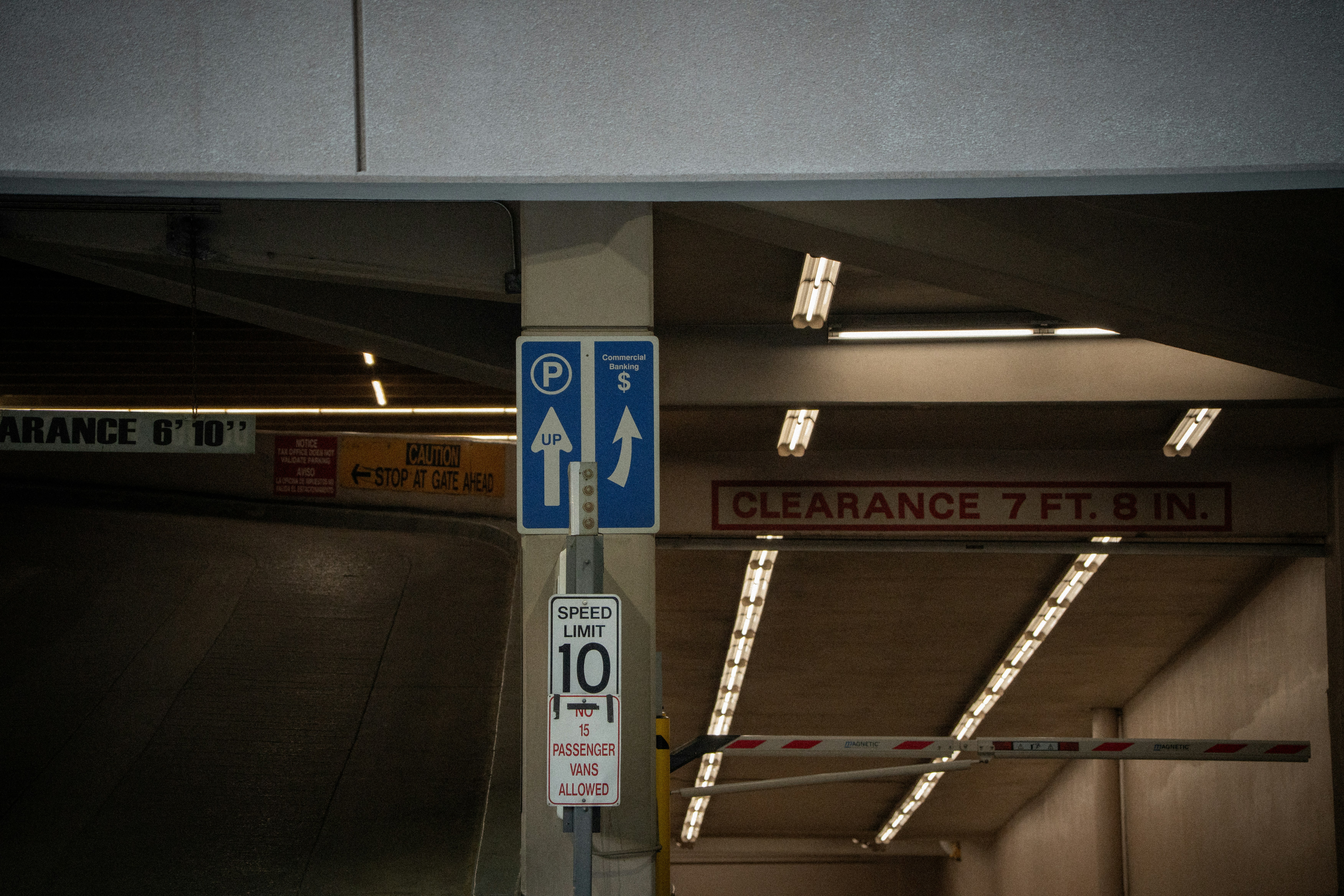 Parking garage entrance with clearance signs