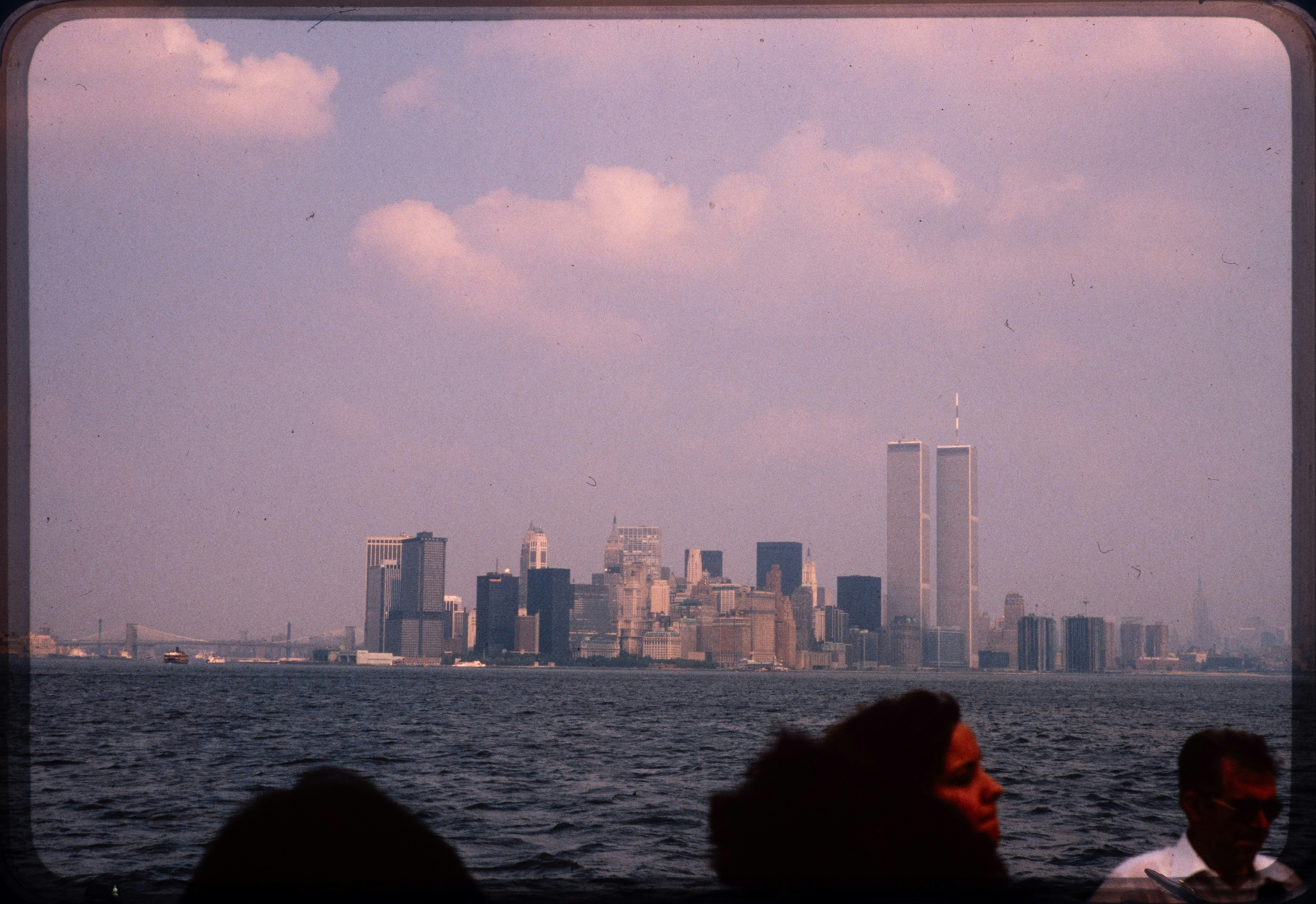 Skyline of new york city with twin towers visible.
