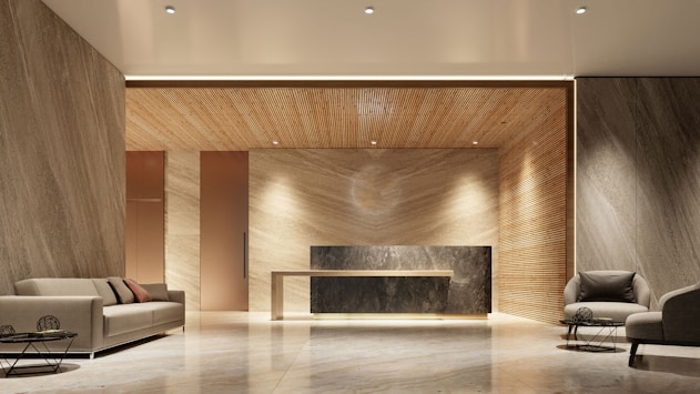 Modern lobby with reception desk and seating area