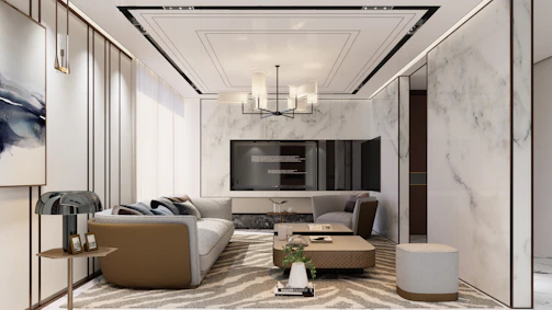 Modern living room with marble accents and stylish furniture.