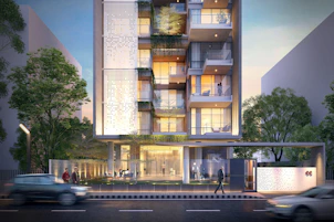 Modern apartment building with balconies and greenery