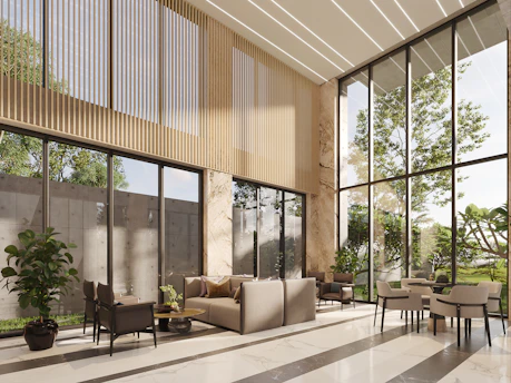 Modern lobby with large windows and comfortable seating.