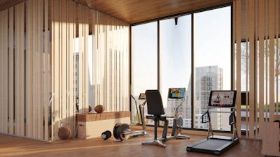 Modern gym with exercise equipment and city view