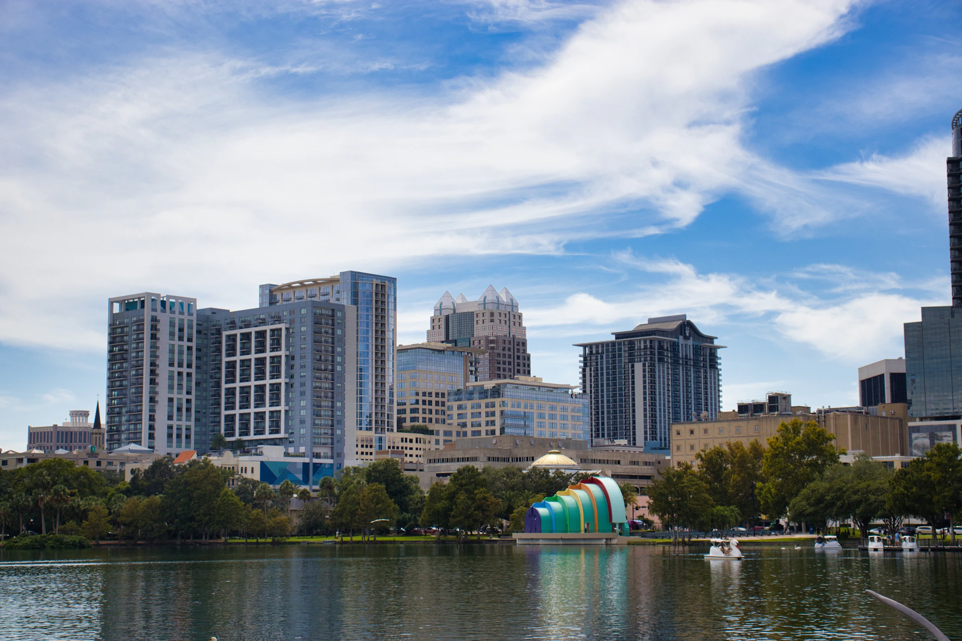 City skyline with lake and blue sky