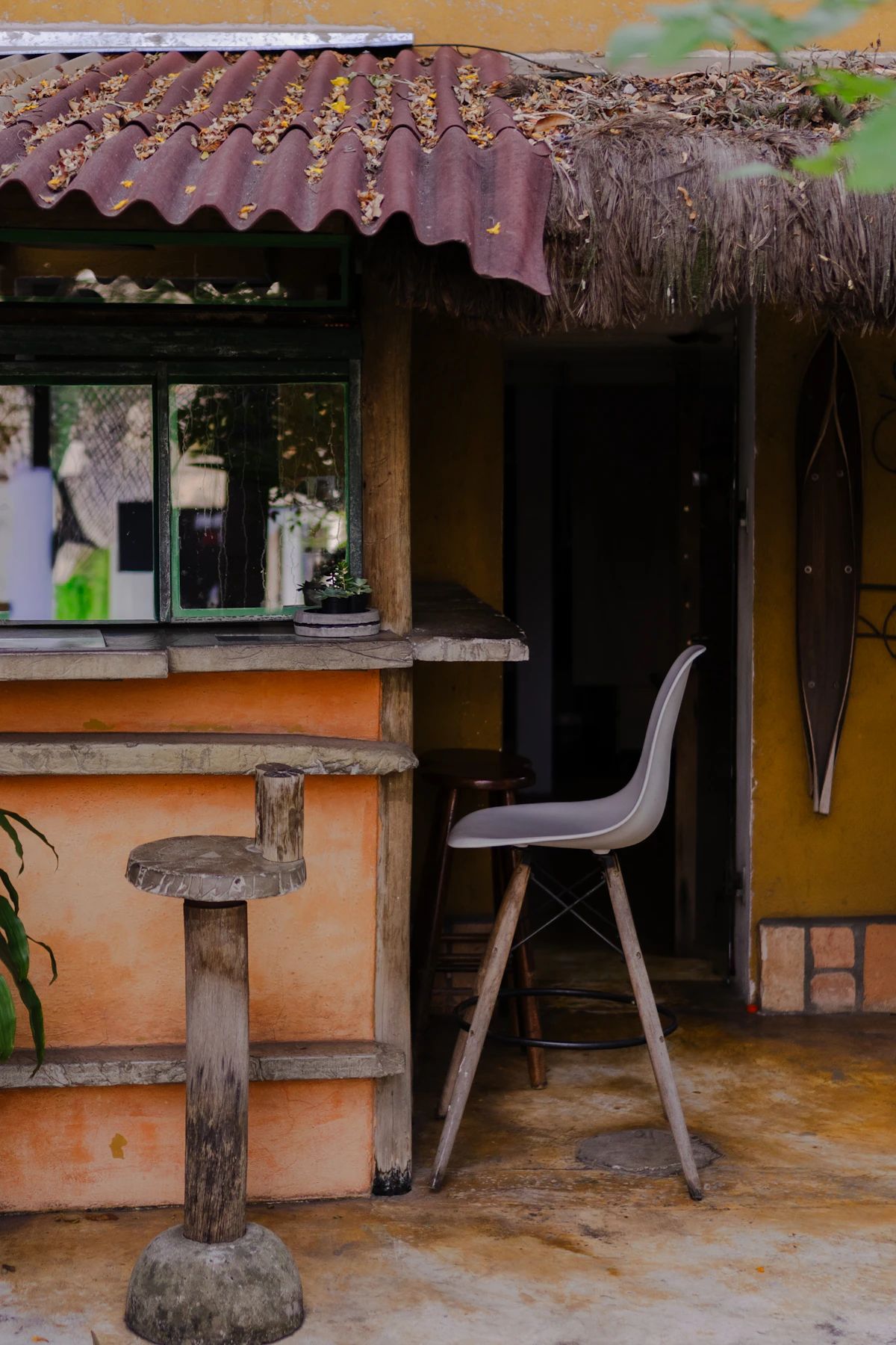 Tropical outdoor bar with stools