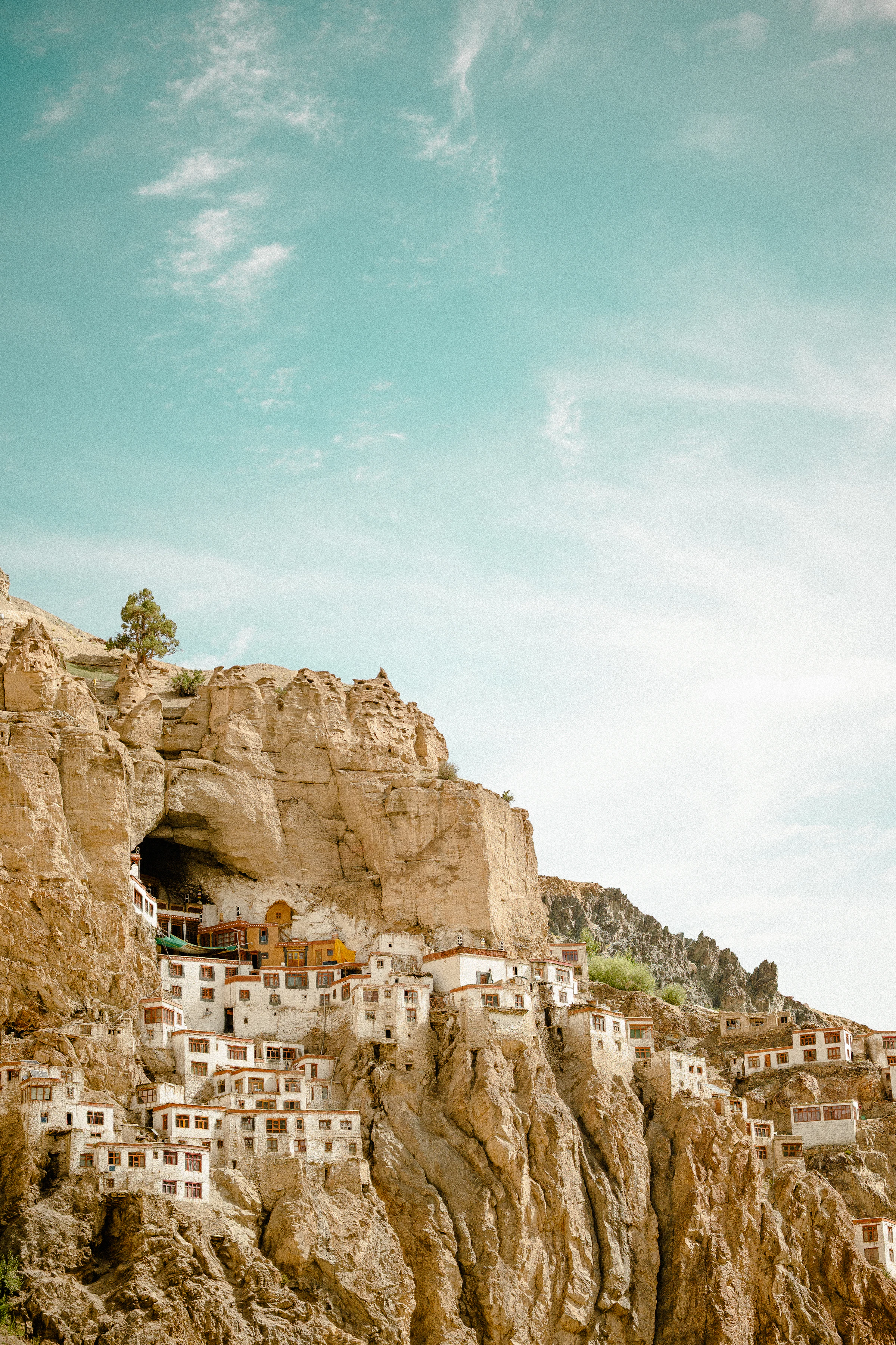 A Buddhist monastery built into a sheer cliff face in Zanskar
