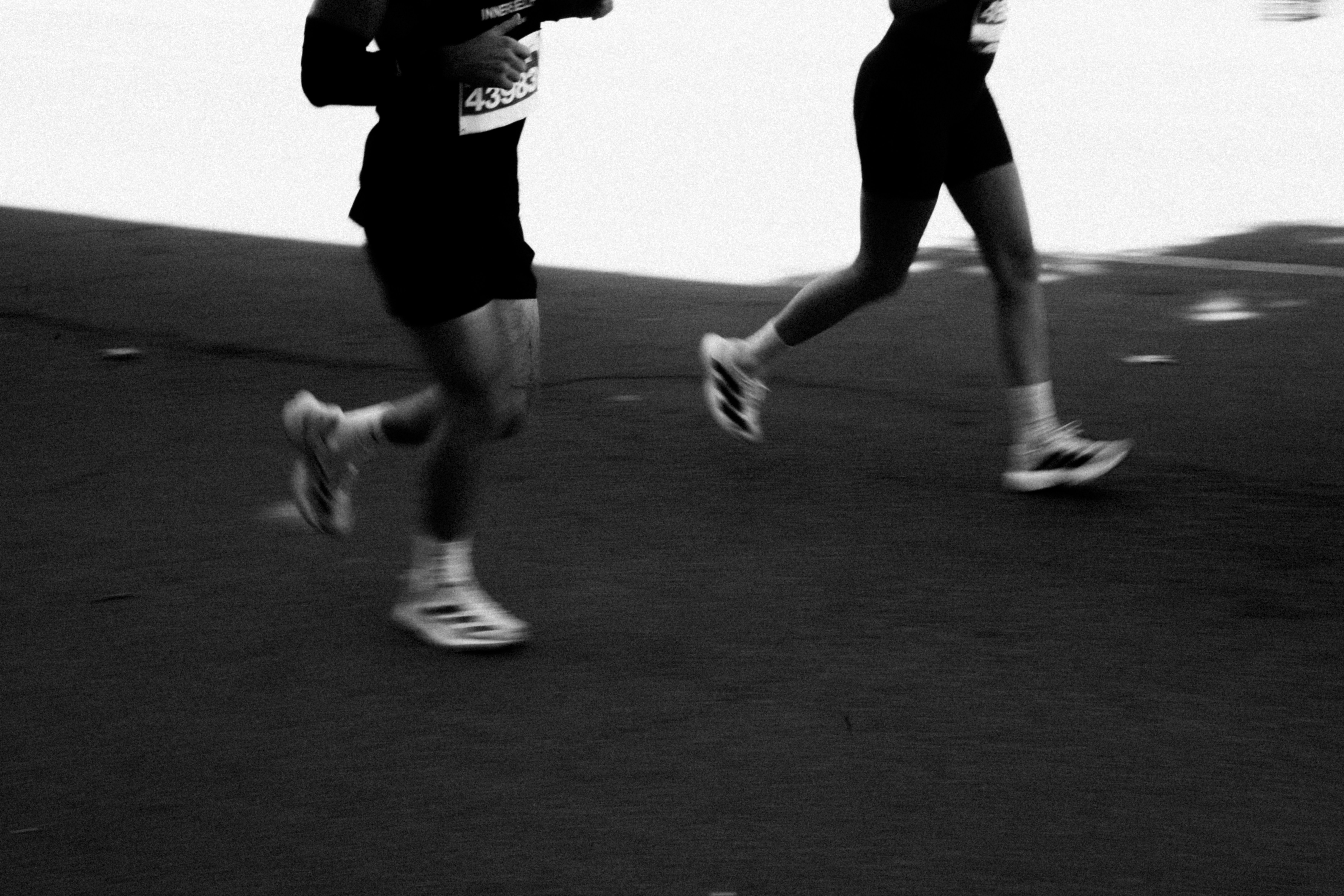 Two runners competing in a race event