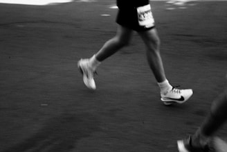Runner's legs in motion during a race