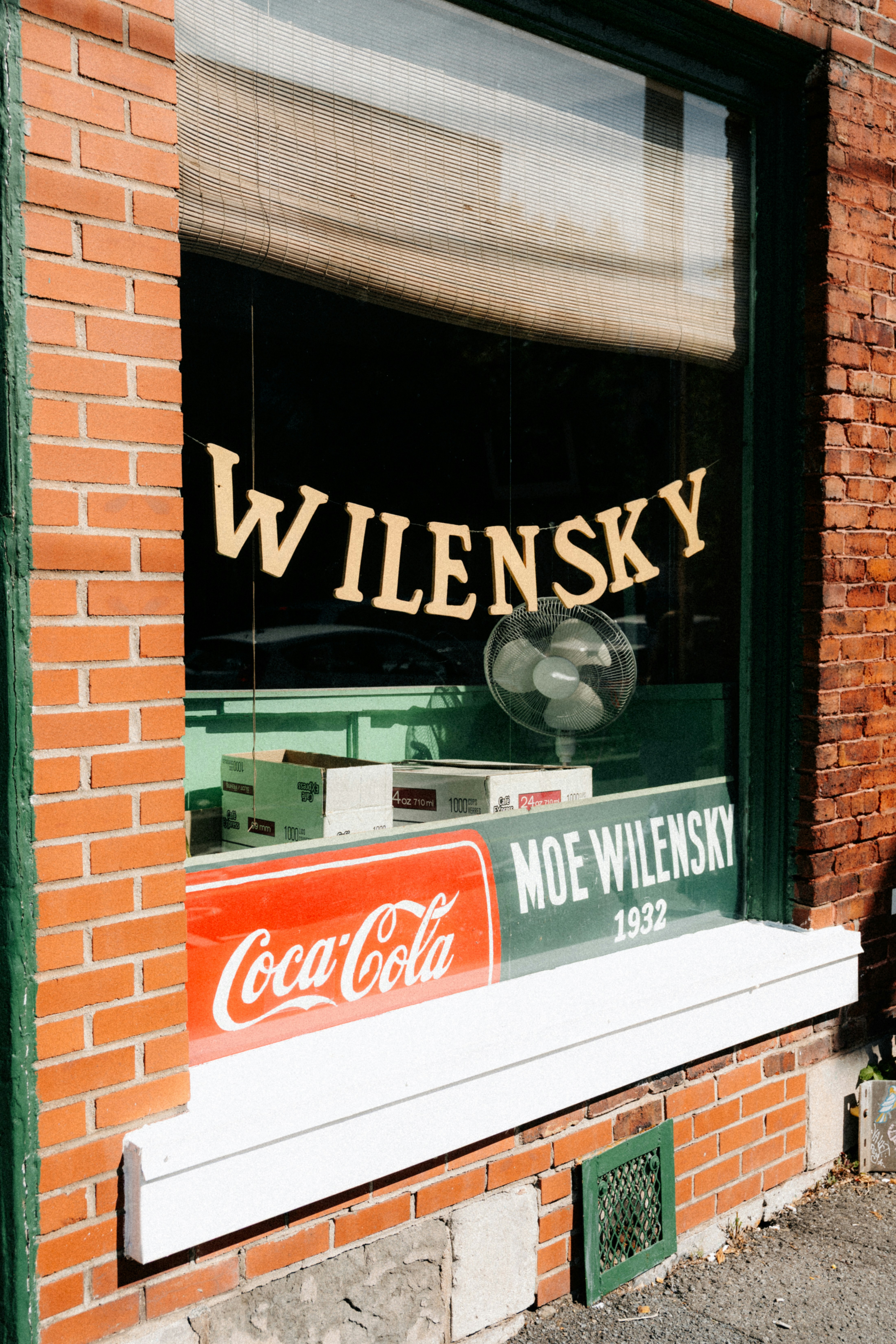 Wilensky's with coca-cola sign and fan