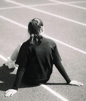Athlete resting on a running track