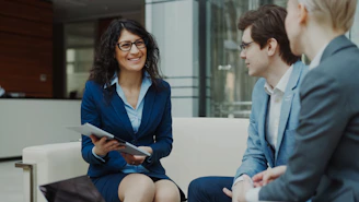 Three business people in a meeting