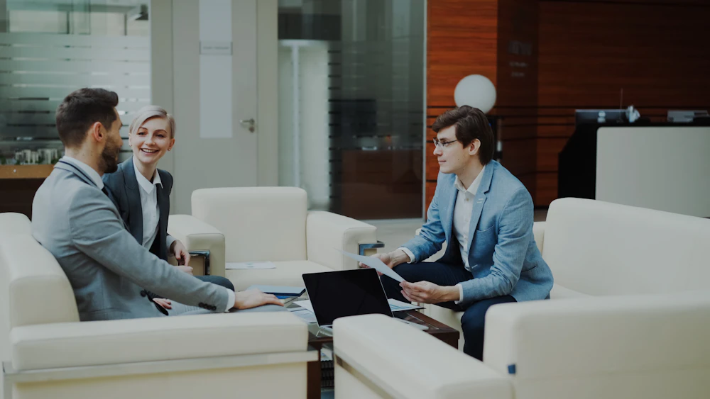 Professionals discussing financial reports