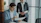Two business people reviewing documents together