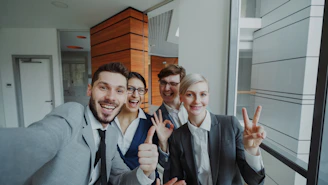 Group of happy business people taking a selfie