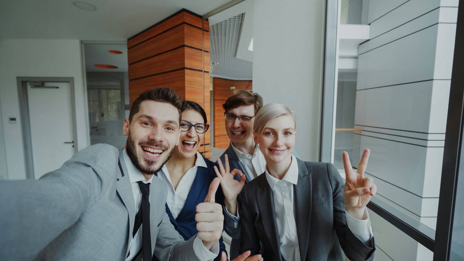 Group of happy business people taking a selfie