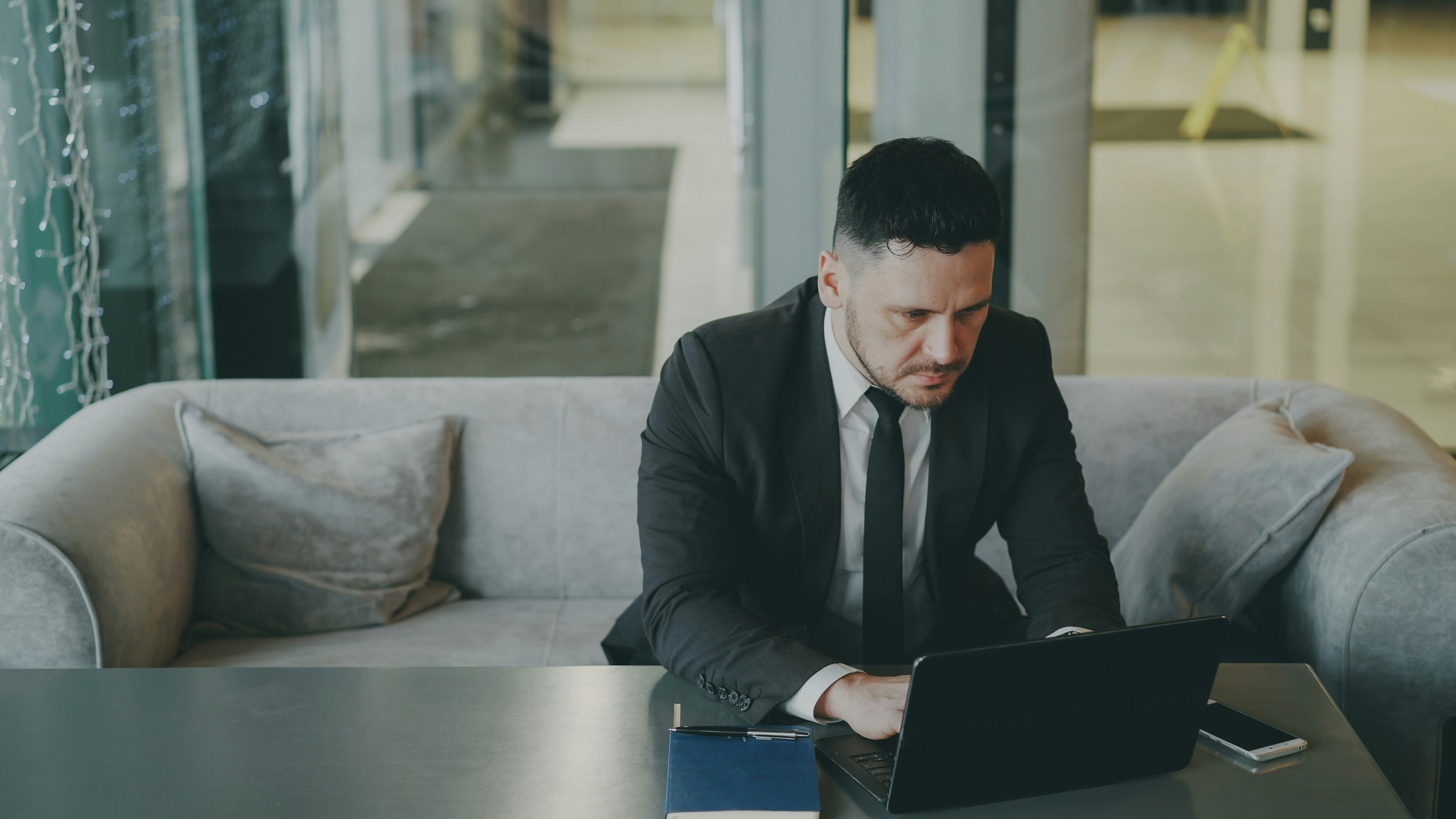 Businessman working in cafe