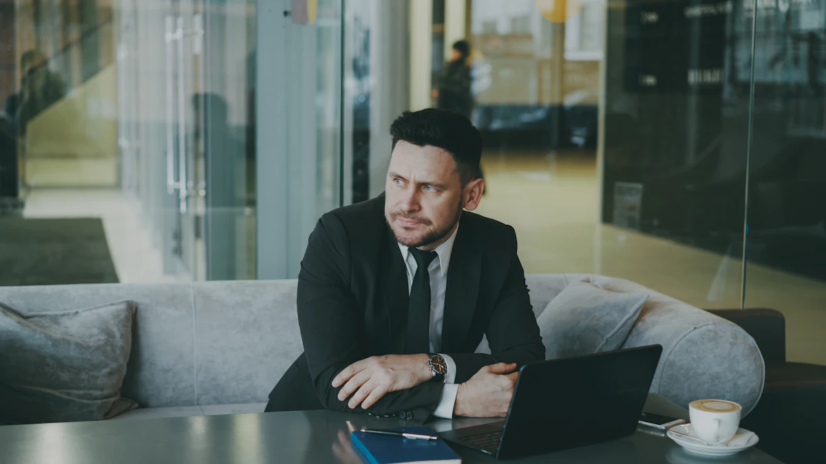 Business owner reviewing a web application on a laptop