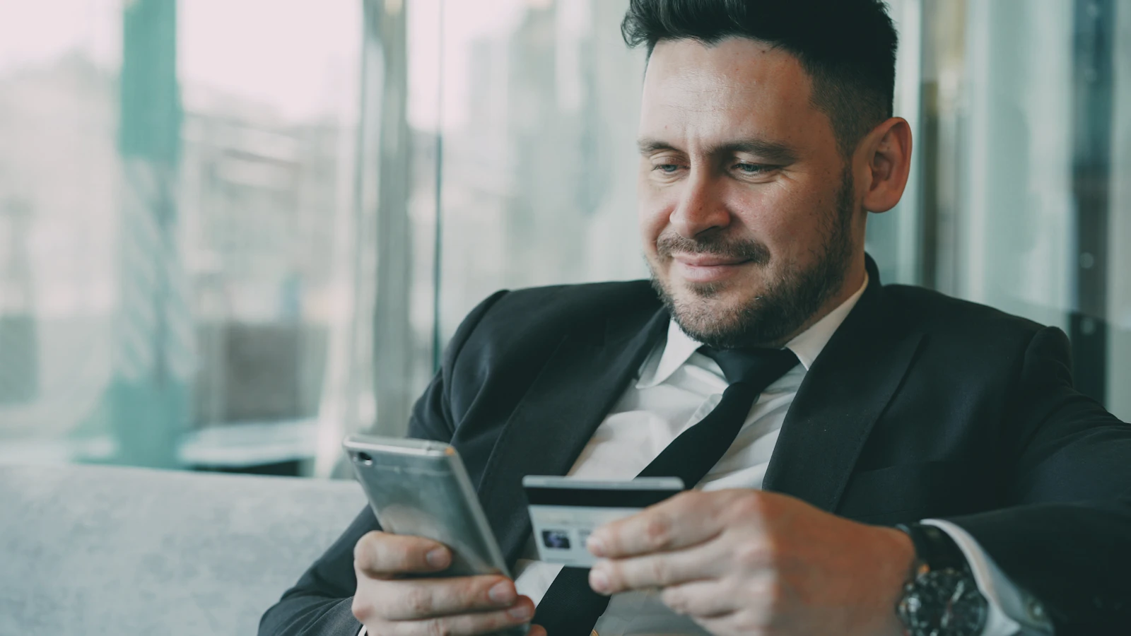 A finance professional reviewing figures in a modern office