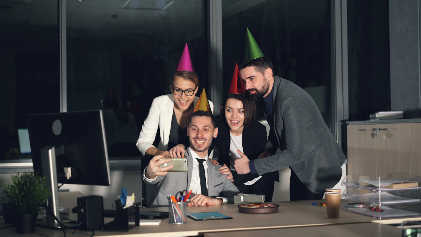 Coworkers celebrating at an office party