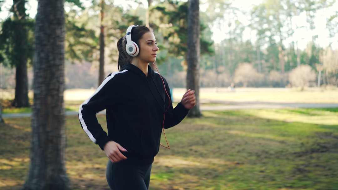A person jogging comfortably outdoors for health and fitness