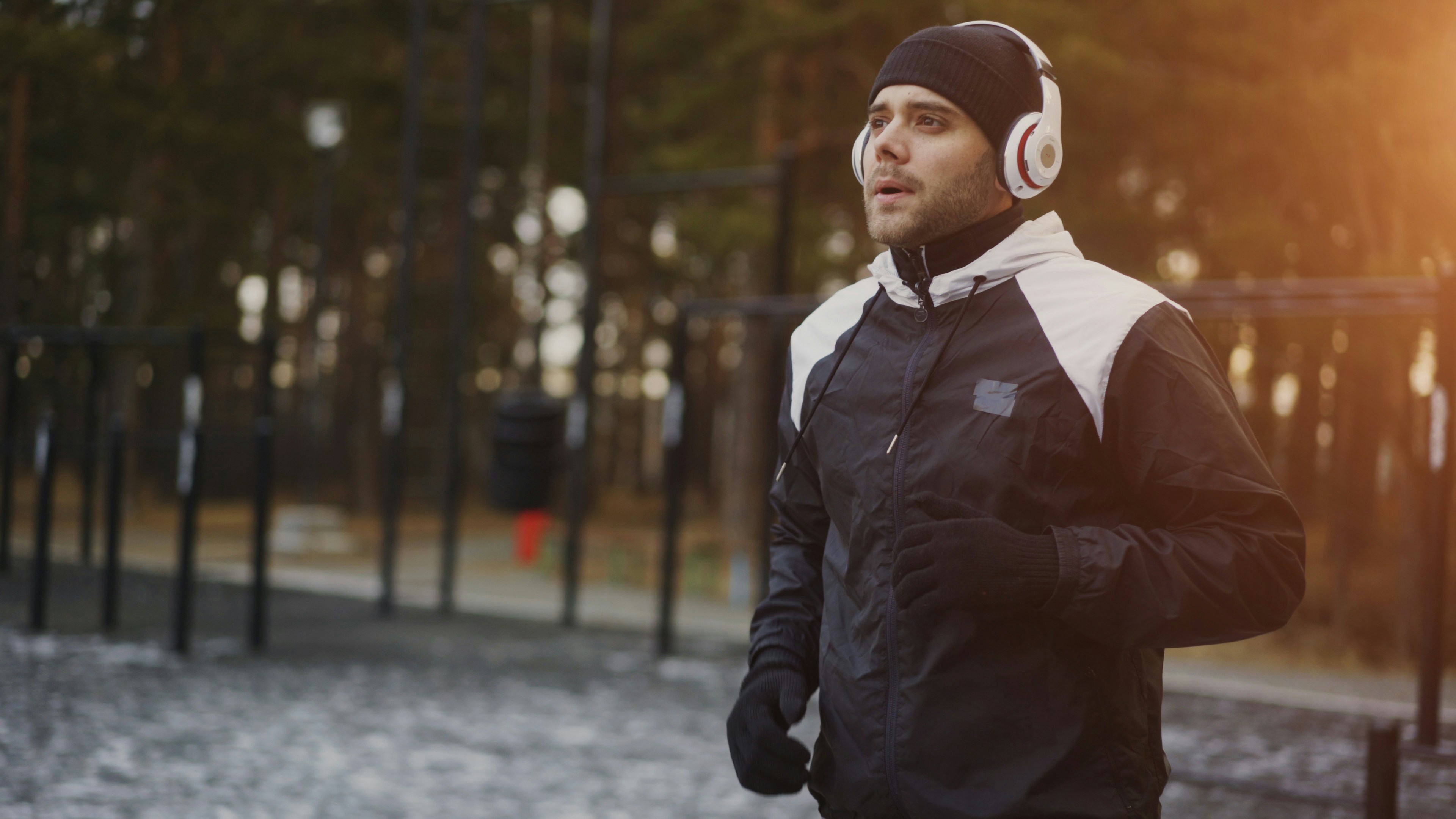 Man with headphones warming up