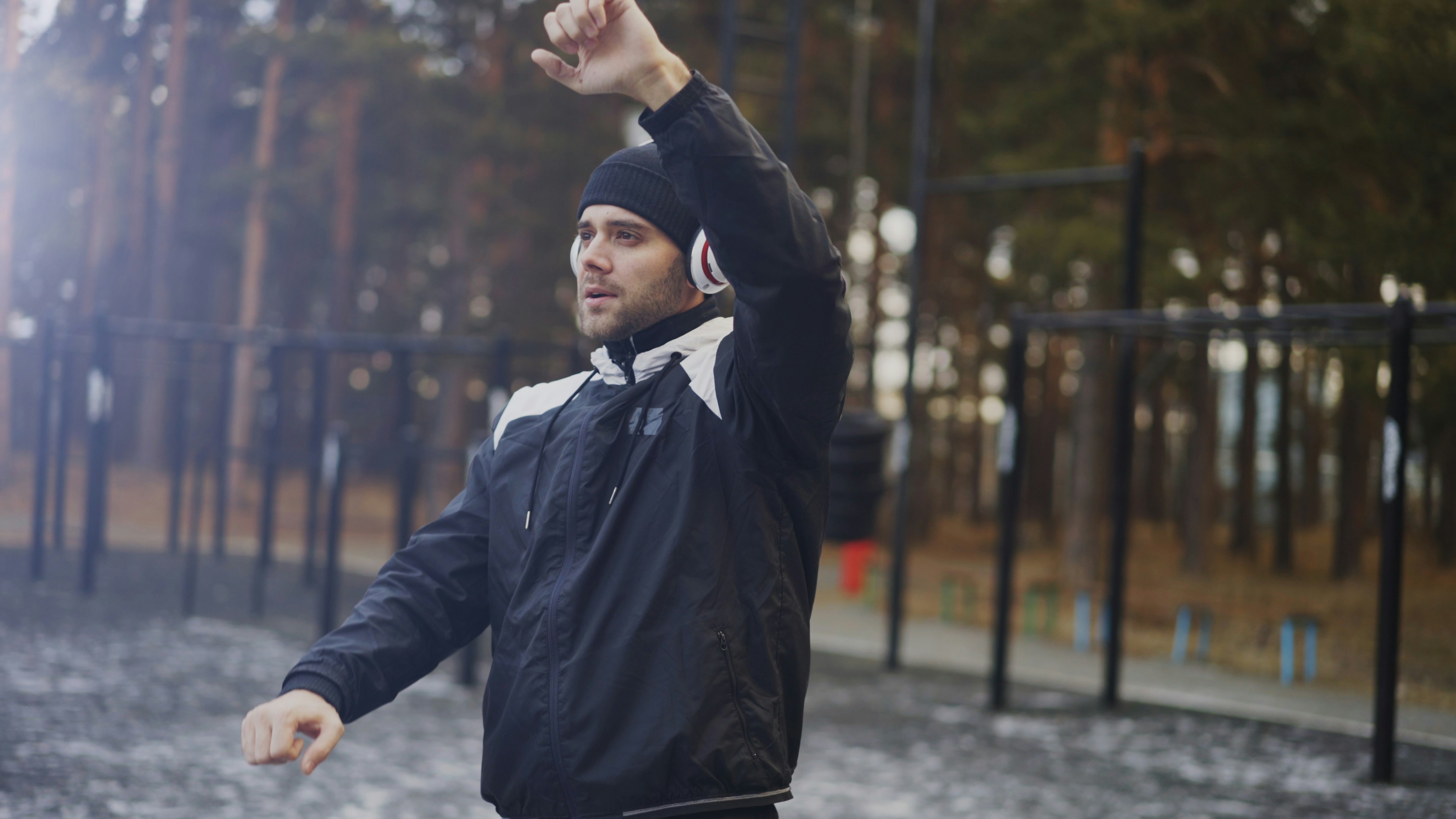 Man stretching with headphones