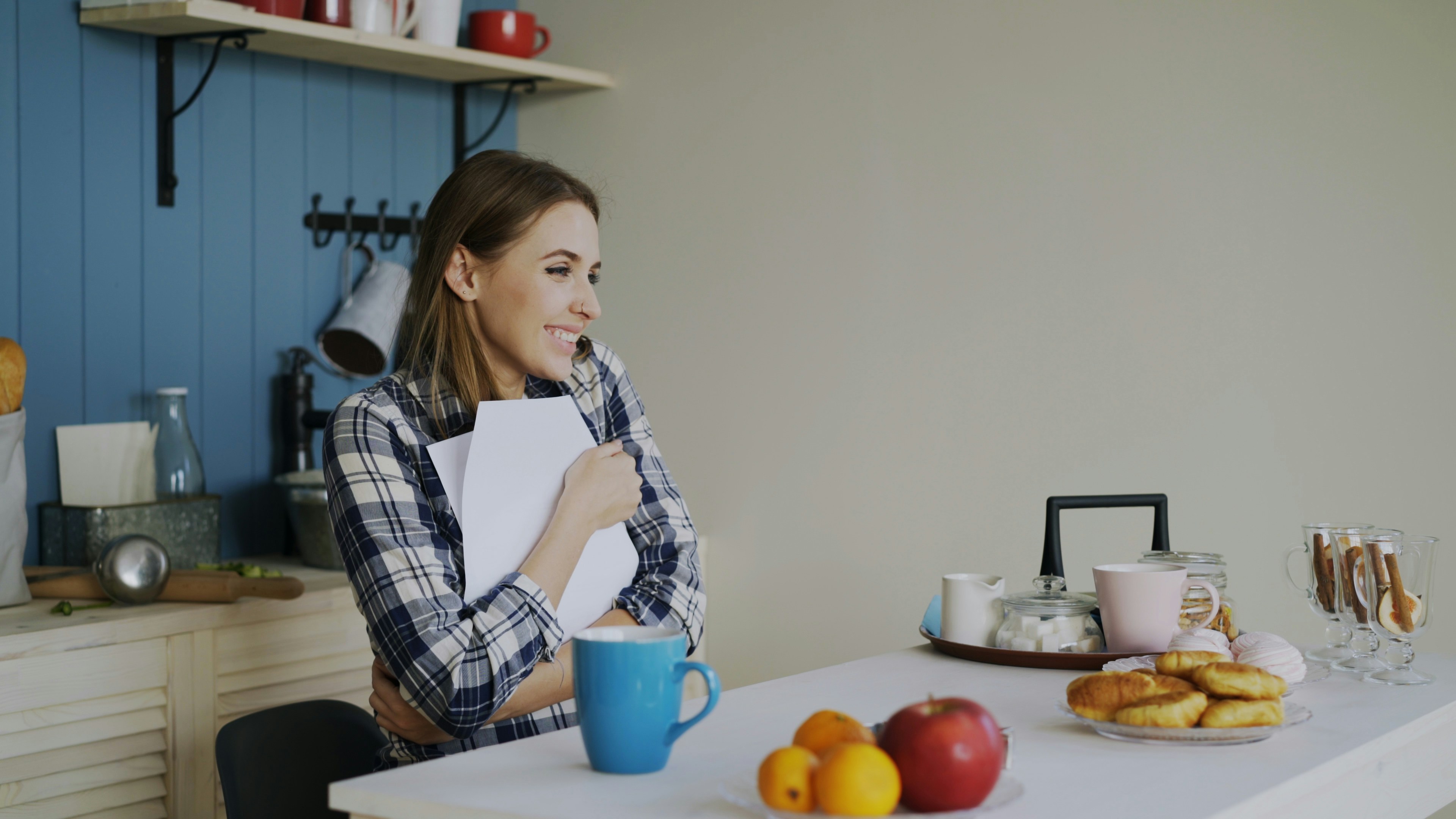 Young happy woman surprised to recieve good news