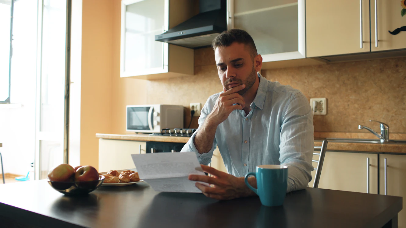 Borrower reviewing a strategy for paying a loan ahead of schedule
