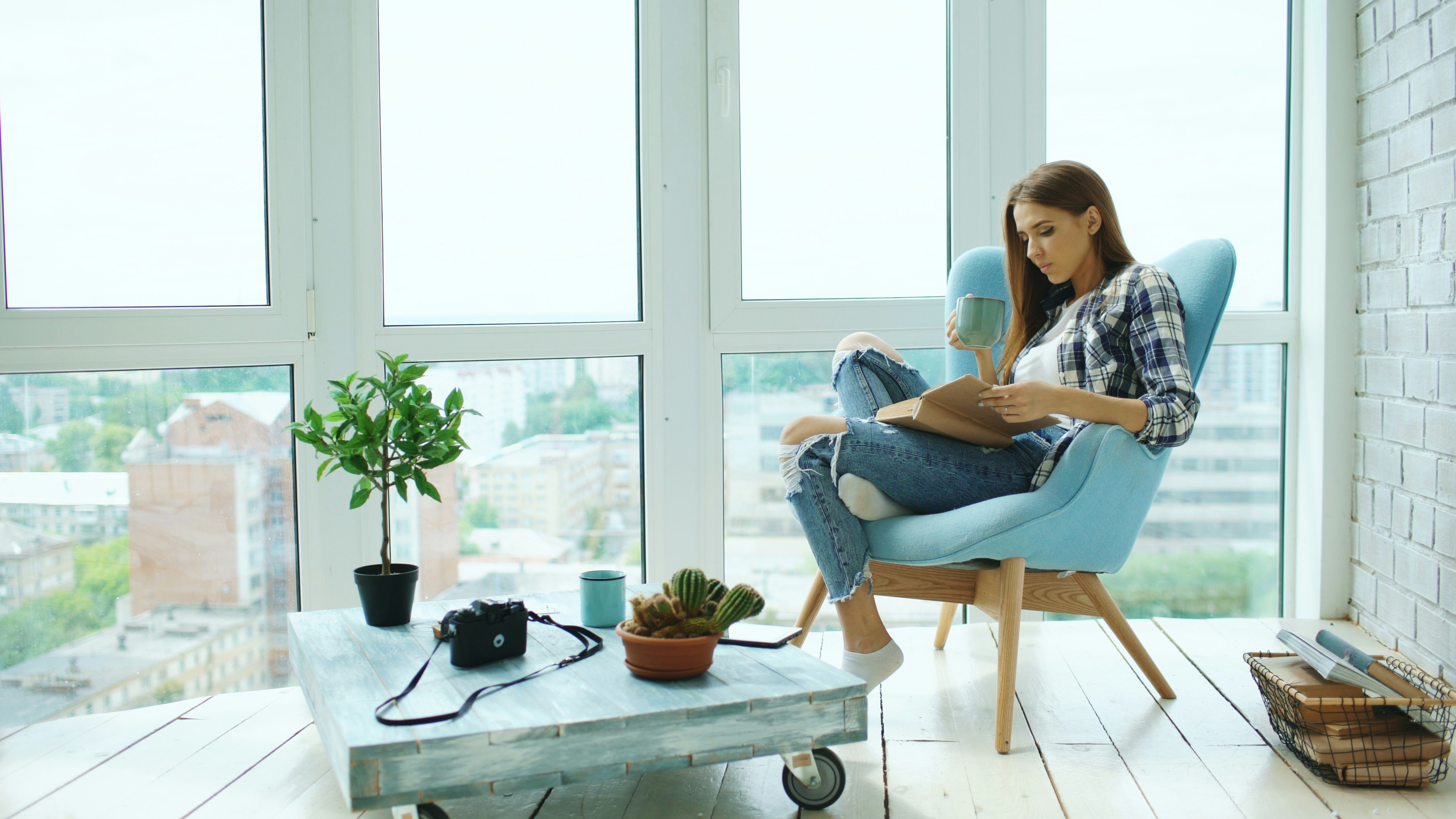 Woman holding houseplants