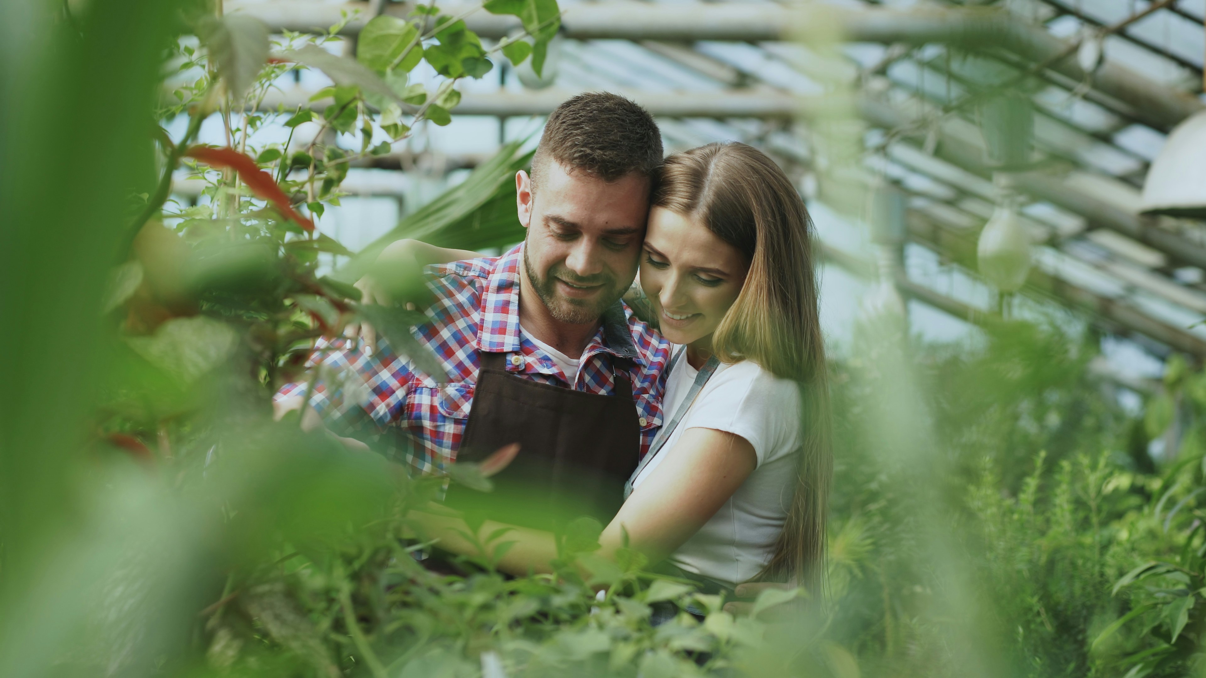 Happy florist couple working