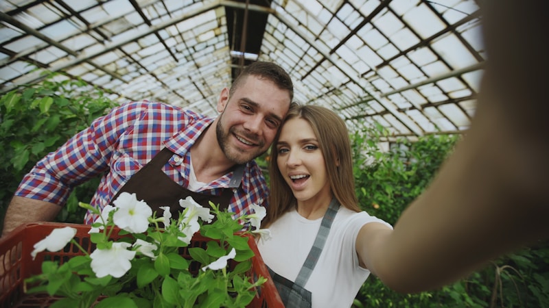 Happy couple posing with flowers
