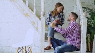 Couple talking on a staircase