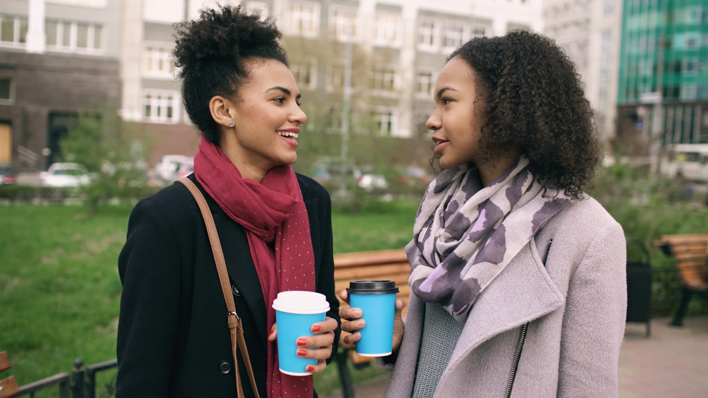 Women sitting together in conversation