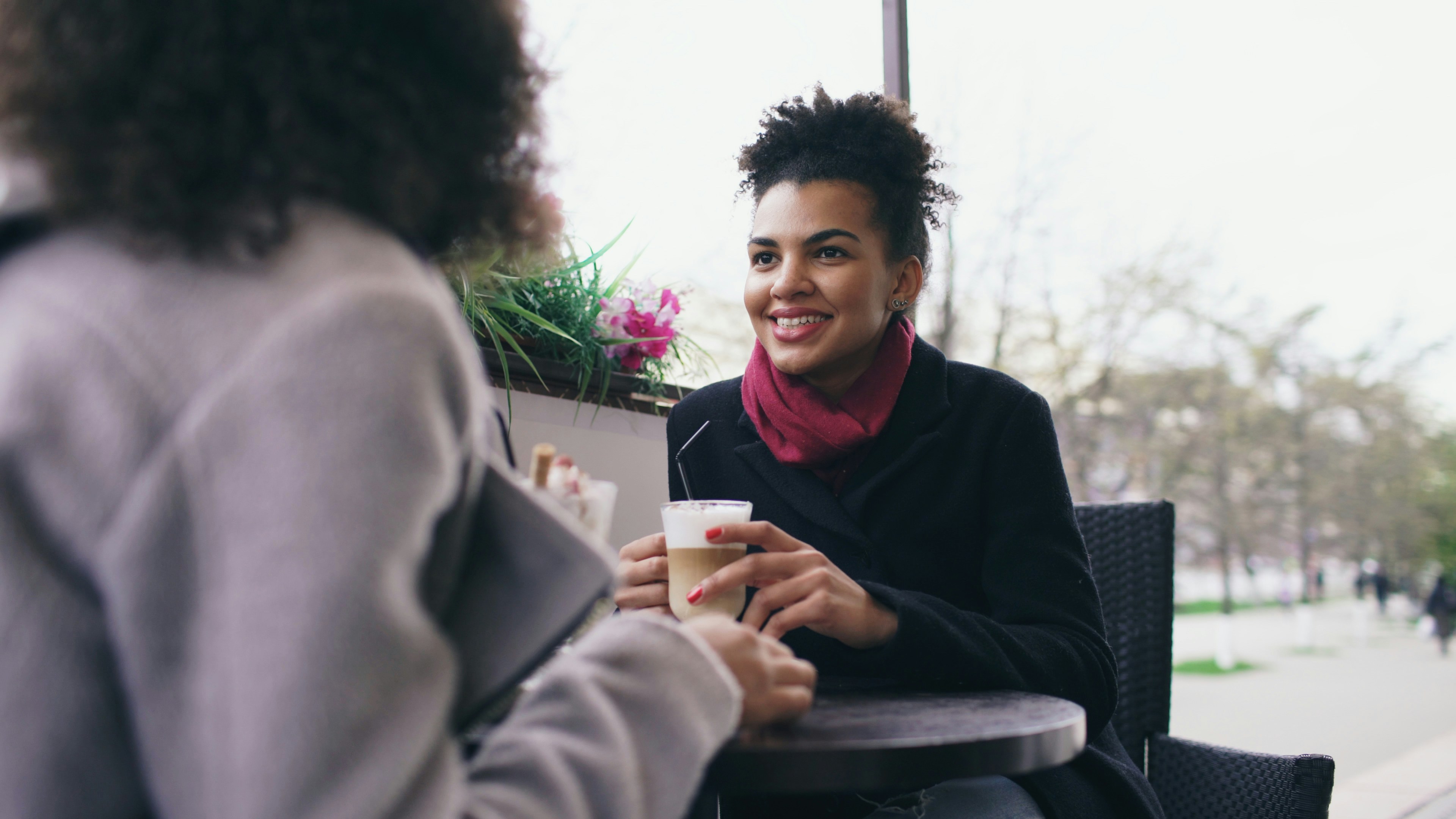 Two women enjoying coffee