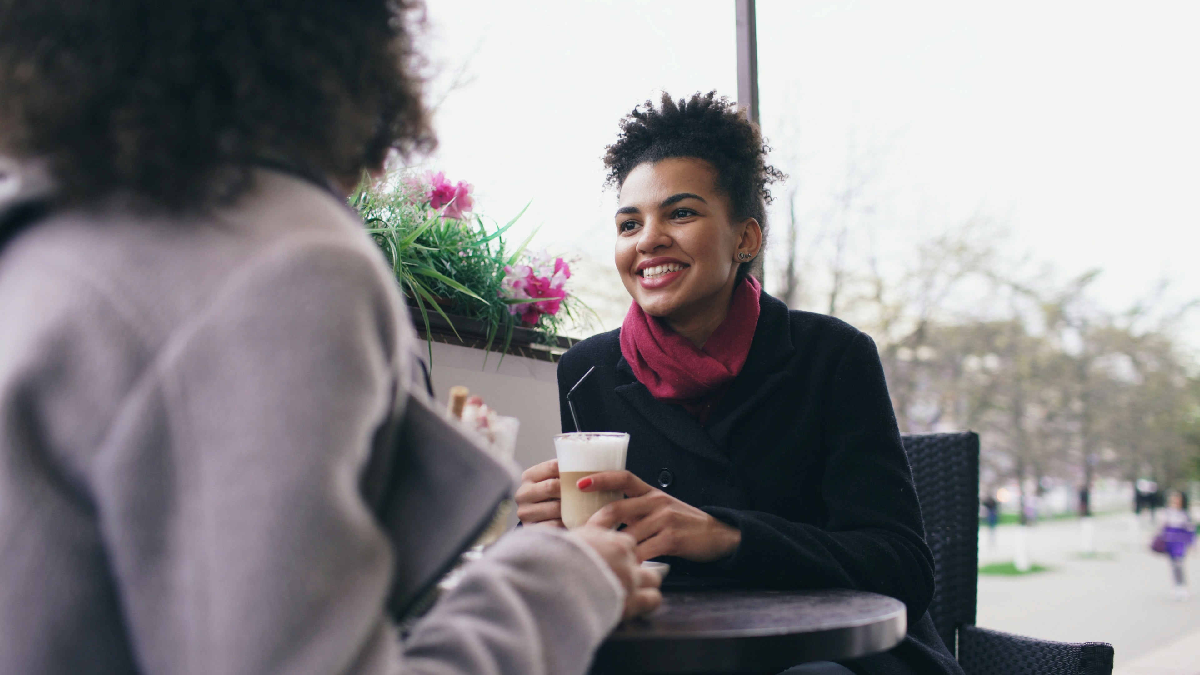 Two friends enjoying coffee