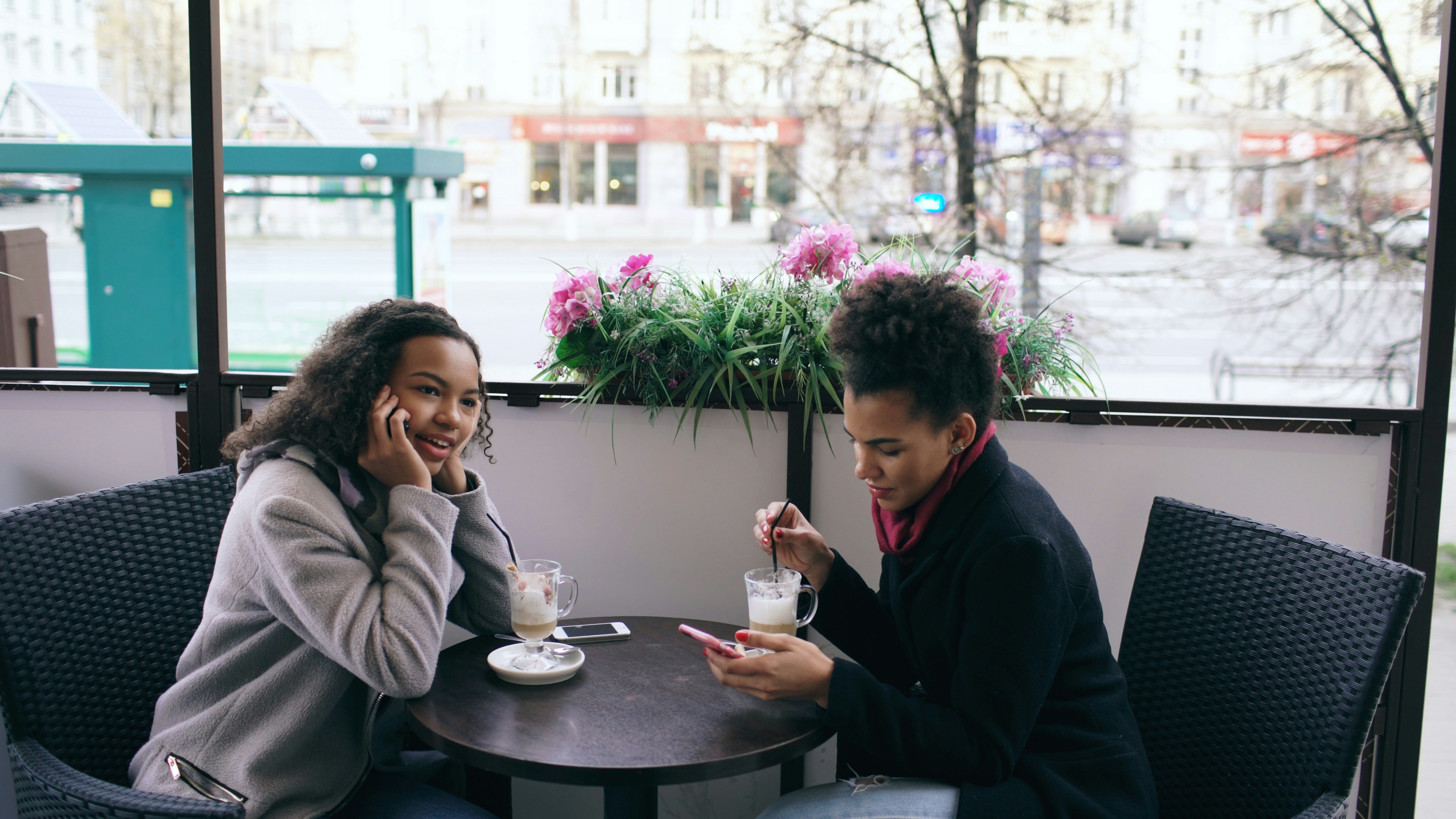 Mixed race woman at cafe