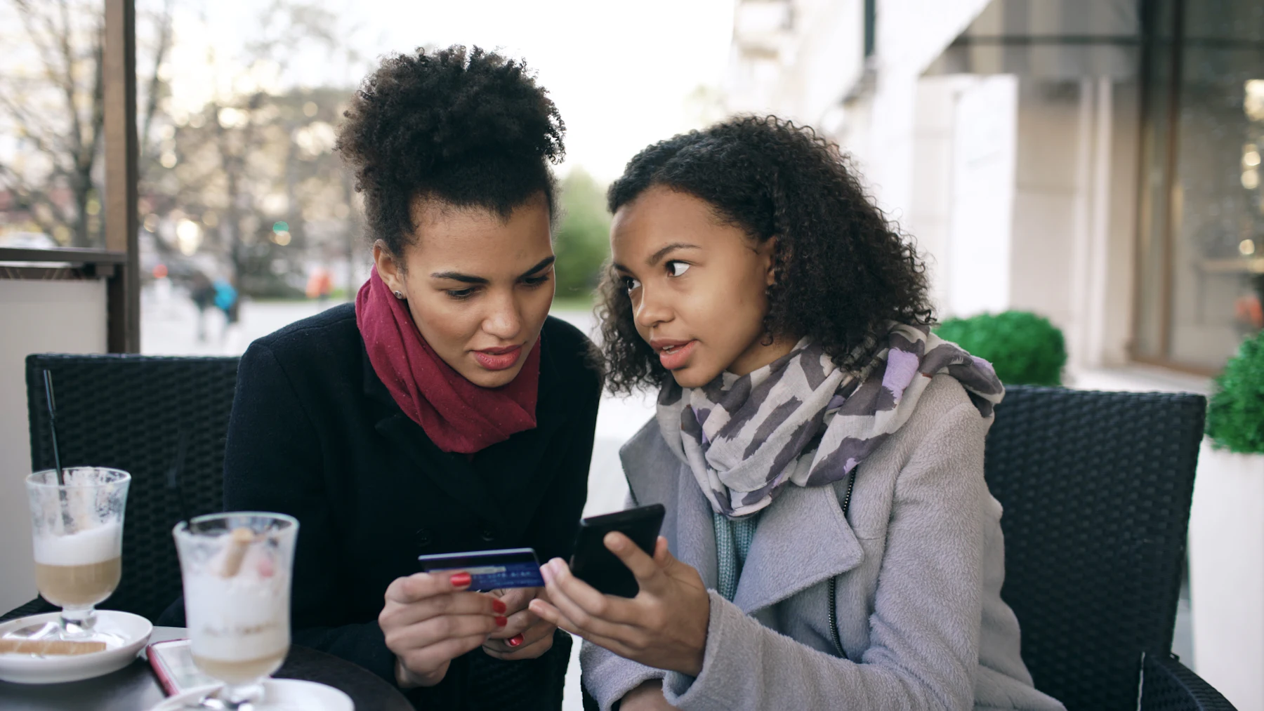Customer paying in a marketplace app on a smartphone with a card