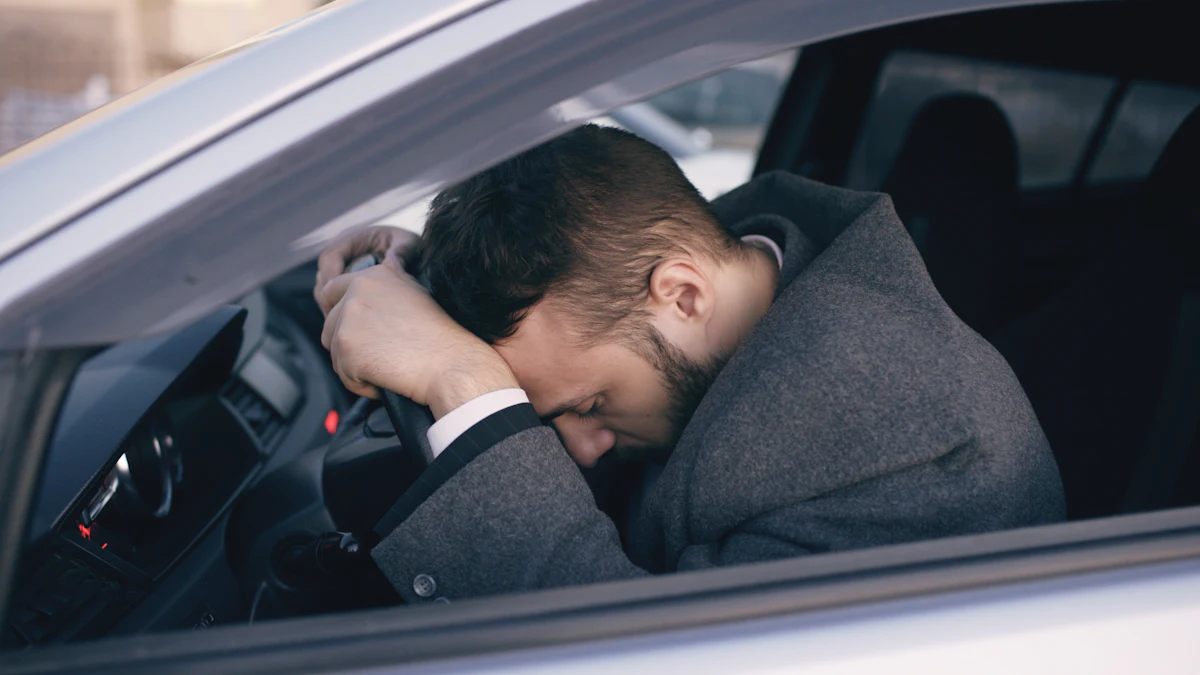 A driver slumped over the steering wheel