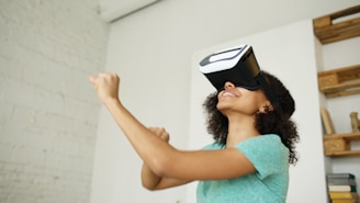 Woman wearing vr headset gesturing with arms