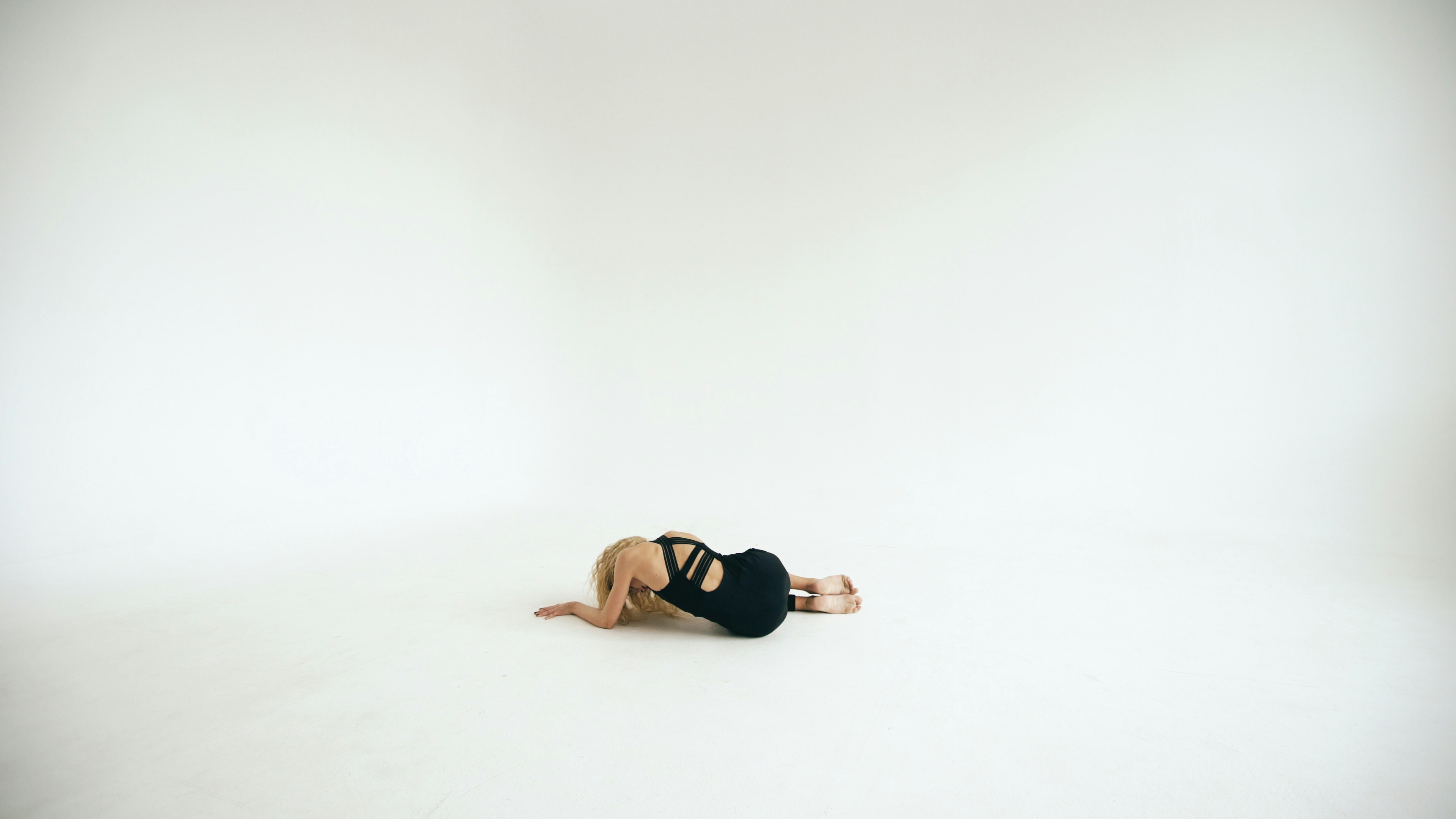 Dancer lying on the floor in a dance studio