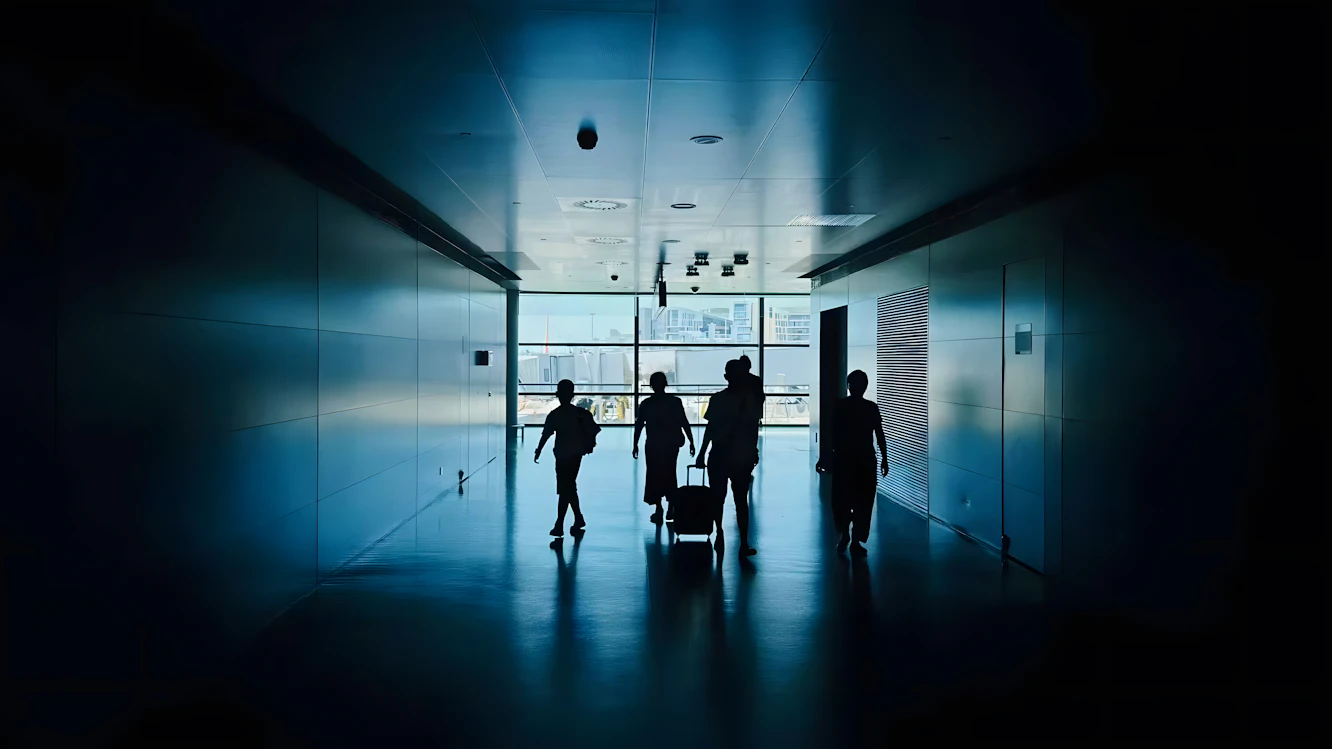 Family travelling through airport