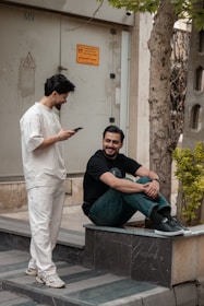 Two men talking on a street