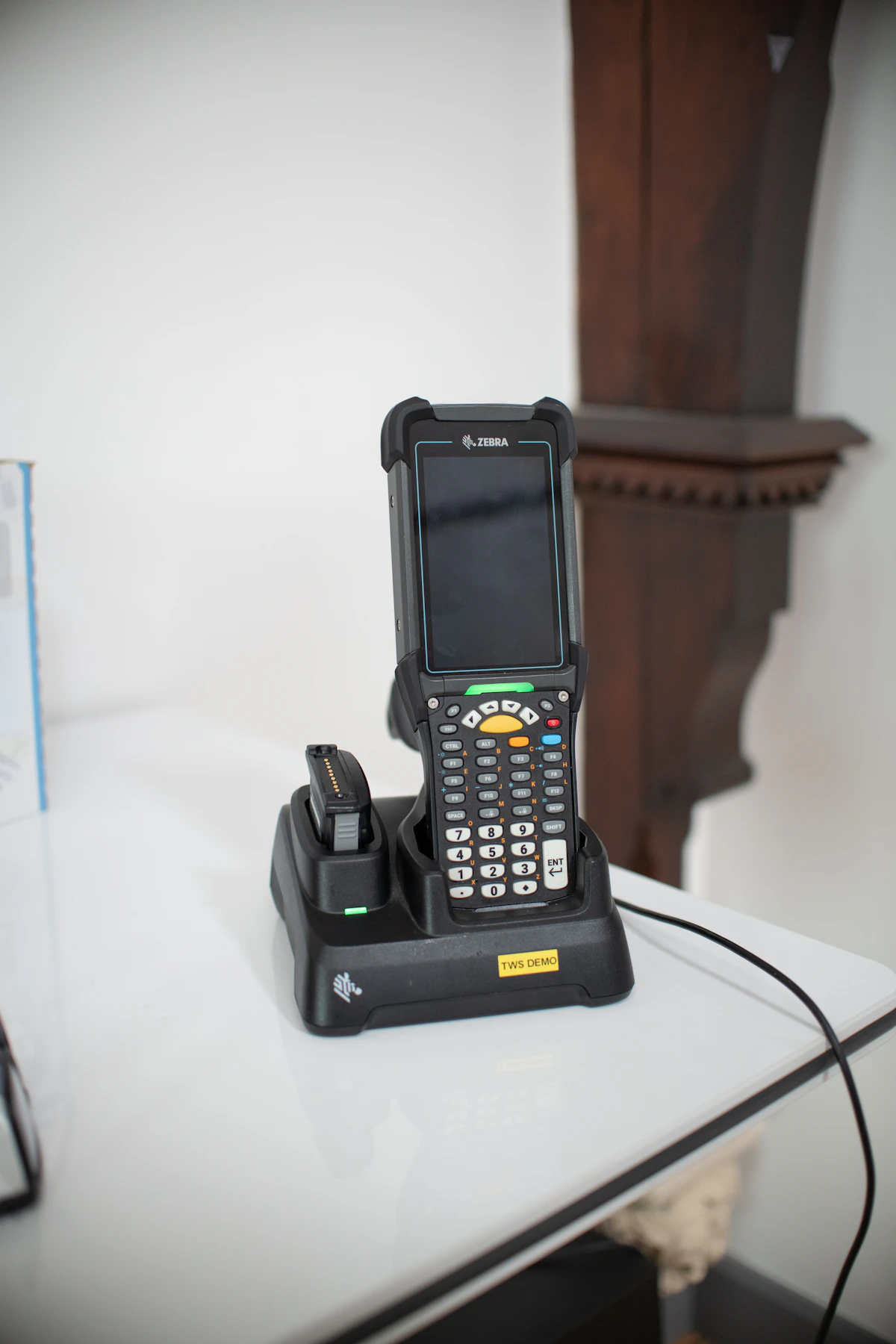 Barcode scanner in a charging dock for supply chain inventory
