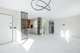 Modern living room with open kitchen and minimalist decor
