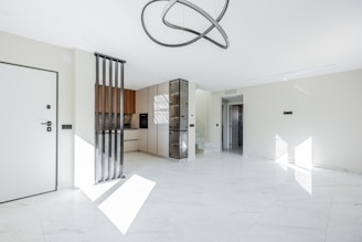 Modern living room with open kitchen and minimalist decor